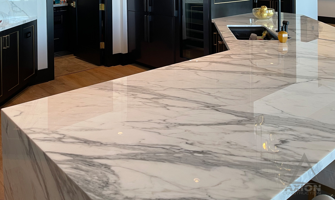 Custom Marble Waterfall Kitchen Countertop Design
                and Construction from Axion Contractor, in St.
                Petersburg, Florida